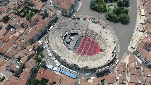 Flying over Arena - Roman amphitheatre in Verona city, Italy, Europe