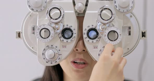 Woman Is Visiting Oculist in Clinic