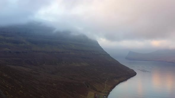 Drone Shot Of Clouds And Mist Over Fjord