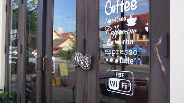 Open Sign In Front Of Coffee Shop