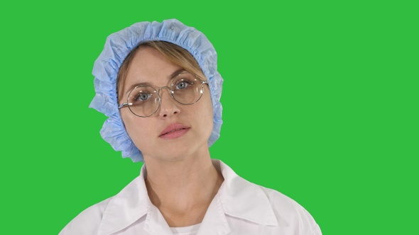 Medical doctor woman going on a Green Screen, Chroma Key.