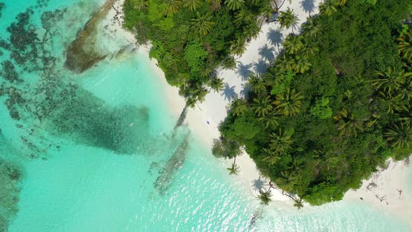 Luxury flying island view of a sandy white paradise beach and aqua turquoise water background in bes