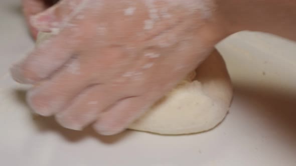 Dough manually bake close-up 4K 2160p UHD footage - Bakery work with dough 4K 3840X2160 UHD video