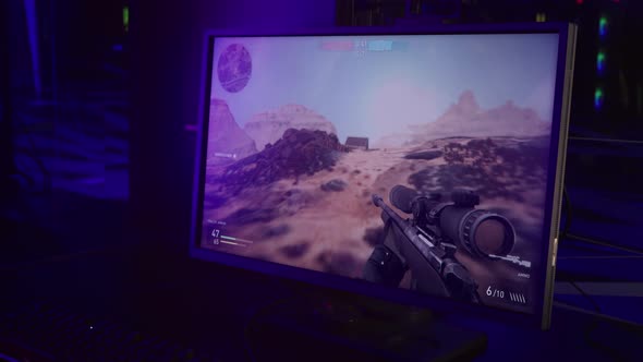 Using the scope of a rifle to find the opponents in the modern pc shooter game alt