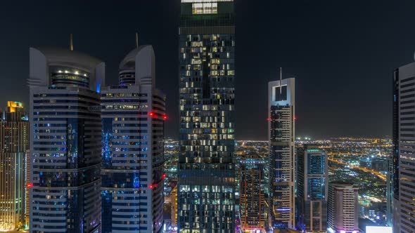 Skyline View of the Buildings of Sheikh Zayed Road and DIFC Night Timelapse in Dubai UAE