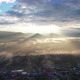 Landscape view of the city of rural village in valley on foggy day while the sun is raising by drone - VideoHive Item for Sale