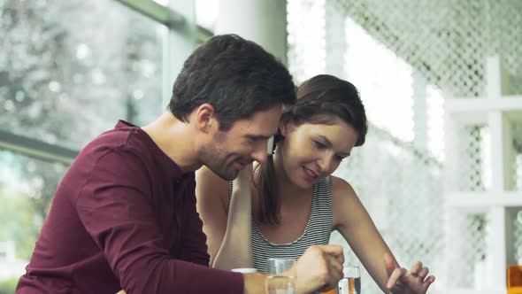 Couple chatting at cafe