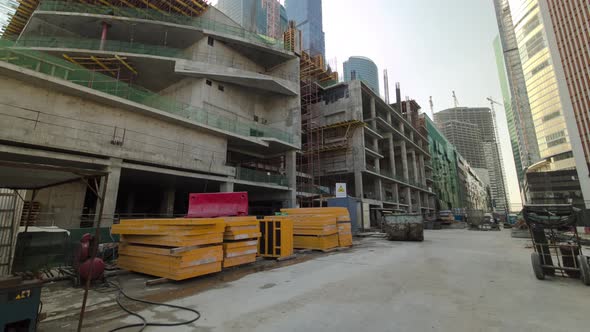 Tower Cranes on Construction Site Surrounded By Skyscrapers Timelapse Hyperlapse