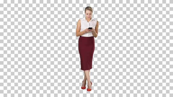 Attractive european female with smartphone in hand touching