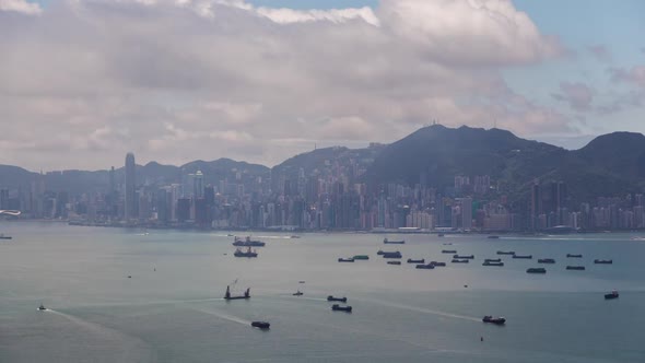 Cityscape Boats Sail on Sea Surface Against Hong Kong City