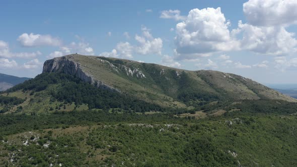 Descending on summer scenery with Stol mountain forests 4K aerial video