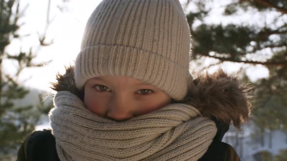 Shy Boy Wrapped in Scarf Posing