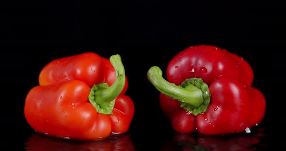 Red Sweet Pepper Falling Into Water with a Splash