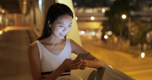 Woman Use of Mobile Phone at Night