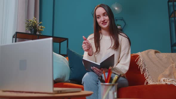 Adult Girl Student Study at Home on Laptop Computer Making Conference Video Call Talking to Webcam