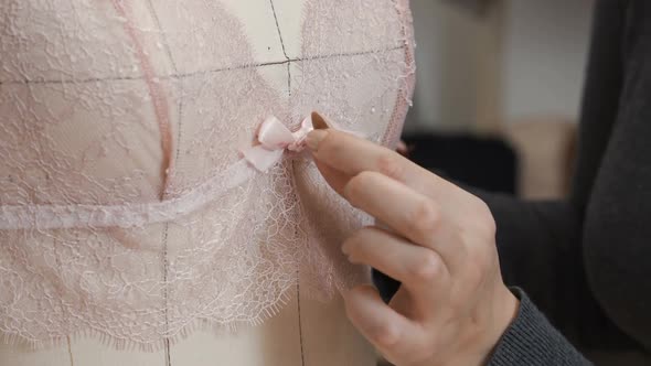 Fashion Designer Tries on Underwear on a Mannequin