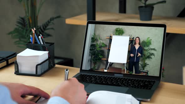 Woman Coach in Laptop Screen Greets Tells Teaches Student Distance Education