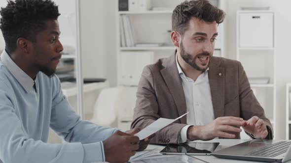 Businessman Talking to Client