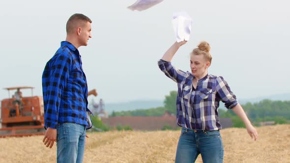 Angry Farmers Quarreling On Field