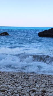 Blue Sea with Waves Rocky Beach