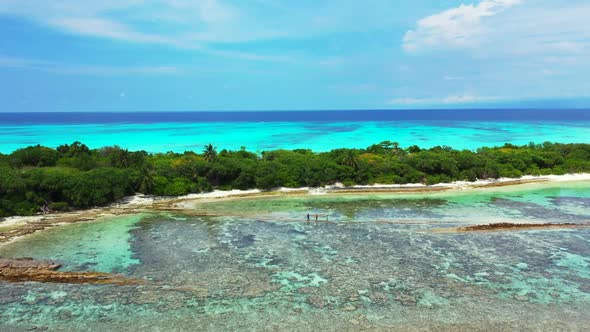 Aerial tourism of tropical sea view beach journey by blue sea and clean sandy background of a dayout