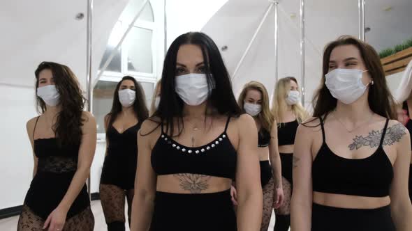 Group of Beautiful Girls at a Fashion Show They are in a Protective Mask Against the Coronavirus