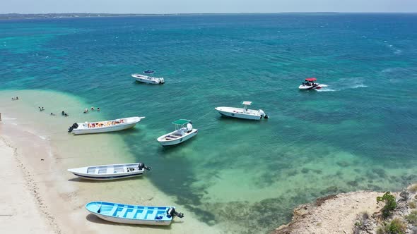 Mooring Lancha Boats On The Coast Of Isla Cabra In The Dominican Republic. Aerial Drone Shot