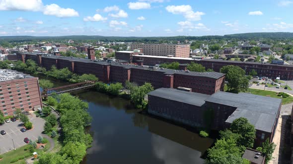 4K - Fly Across The Nashua River To 19th Century Mill Buildings