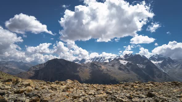 Wild High Mountain Landscape With Moving Clouds