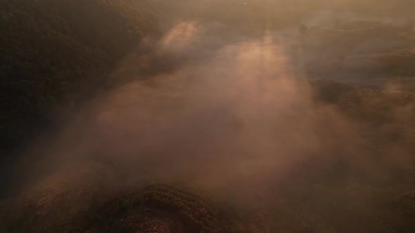 4K Aerial view of Mountains landscape with morning fog.