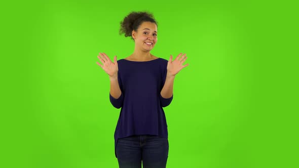 Upset Woman Negatively Waving Her Head Expressing She Is Innocent. Green Screen