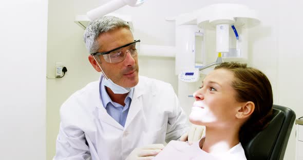 Dentist examining a patient