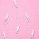 Menstrual tampons move on a pink background. Cotton tampon for women. - VideoHive Item for Sale