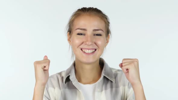 Young Female Student Reacting To Success , Excited