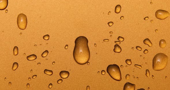 Abstract water drops on gold bronze background, macro, Bubbles close up