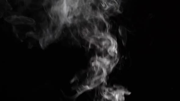 Cloud of Cigarette Smoke on Black Background
