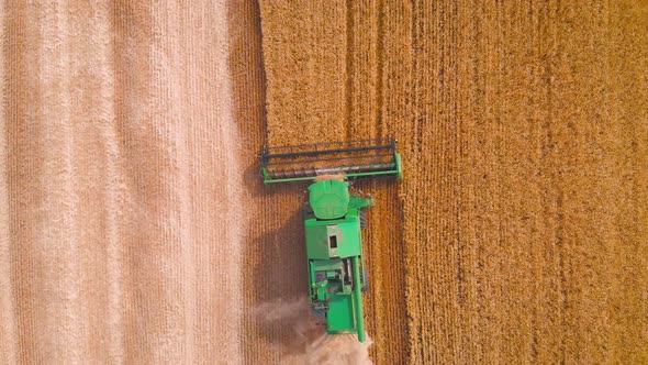  Impressive Flight Over a Working Combine Harvesting Tons of Ripe Barley
