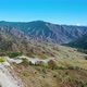 Aerial View Mountain Road in a Sunny Day. Mountain Pass Chike-Taman, Mountain Altai Region, Russia.  - VideoHive Item for Sale