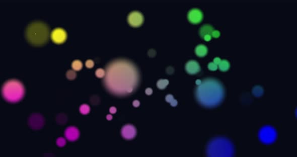 Animation of multi coloured glowing spots of light moving in hypnotic motion on black background