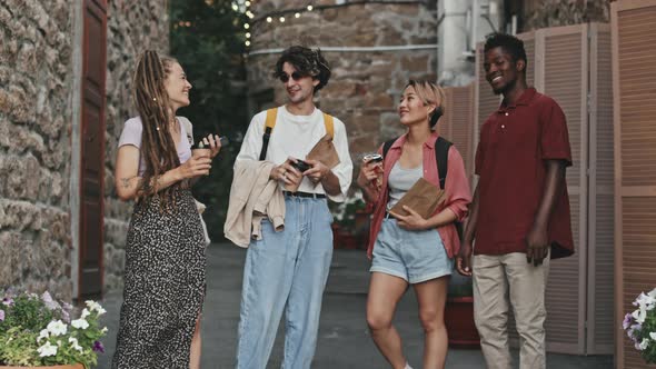 Portrait of Diverse Millennial Friends Outdoors in Summer