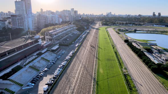 Drone view of horses racing at the Hipodromo Argentino de Palermo, Buenos Aires