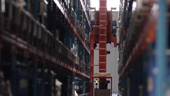 Warehouse with boxes on pallet racks, logistics center. Large modern warehouse.