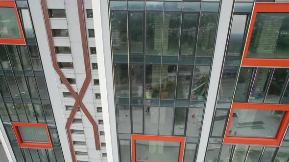 Aerial View of the Exterior of a Modern Hotel Building with Large Windows