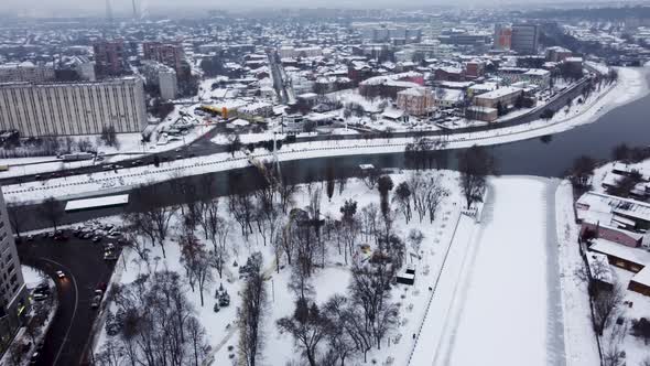 Skver Strilka park on winter river in Kharkiv city