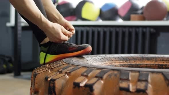 Female Athlete Tying Shoelaces