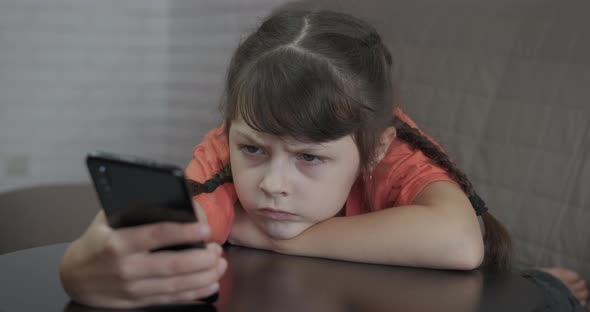 Child Browsing on Smartphone