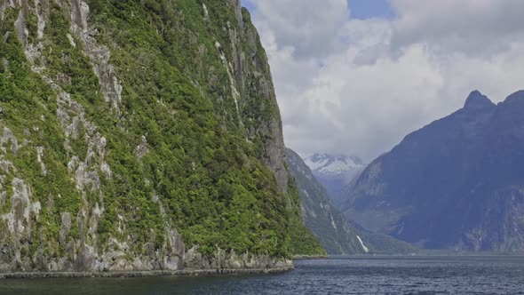 Milford Sound With Mountain View At Daytime In Fiordland, New Zealand. - wide shot