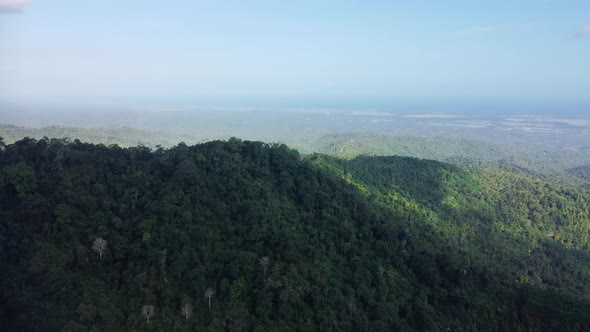 Drone Flying Near Mountains and Volcano