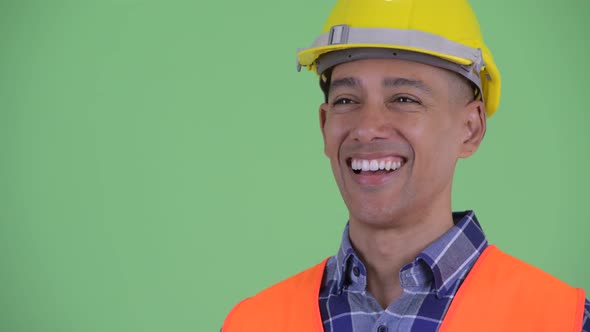 Face of Happy Multi Ethnic Man Construction Worker Thinking