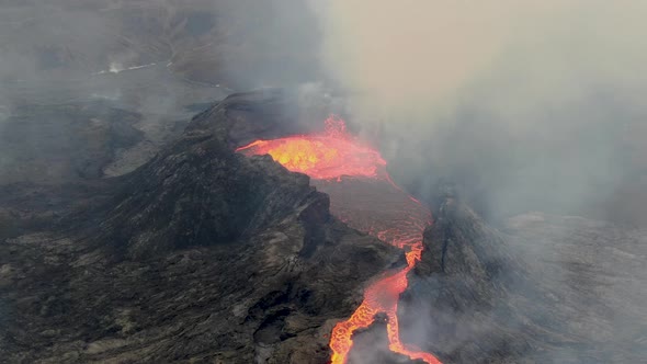 Hot lava flowing from Fagradalsfjall erupting volcano near Grindavik, Iceland